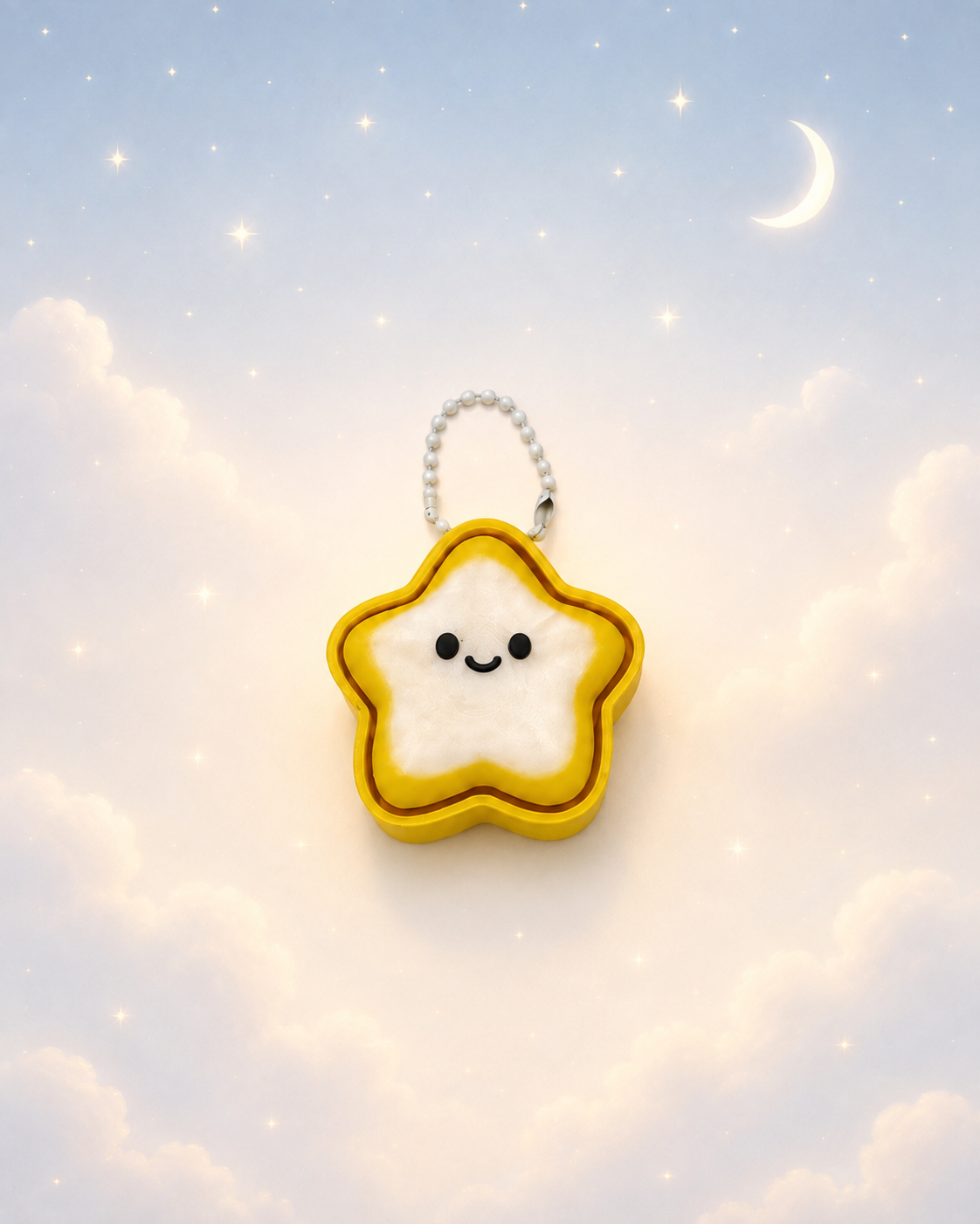 BiColor Yellow with Translucent White star keychain clicker on a dreamy celestial background
